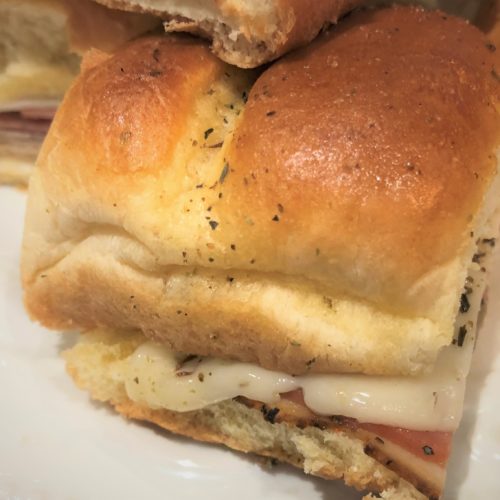 Close up of Italian Sliders with melting cheese