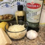 Fresh whole lemon, head of garlic, olive oil, fresh parmegiano reggiano, Digon Mustard