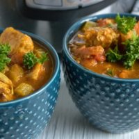 Instant Pot Chicken Curry served in two blue bowls