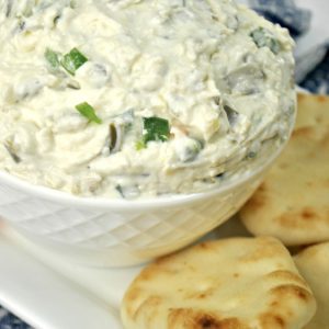 Creamy white dip with cream cheese,, artichokes and jalapeno