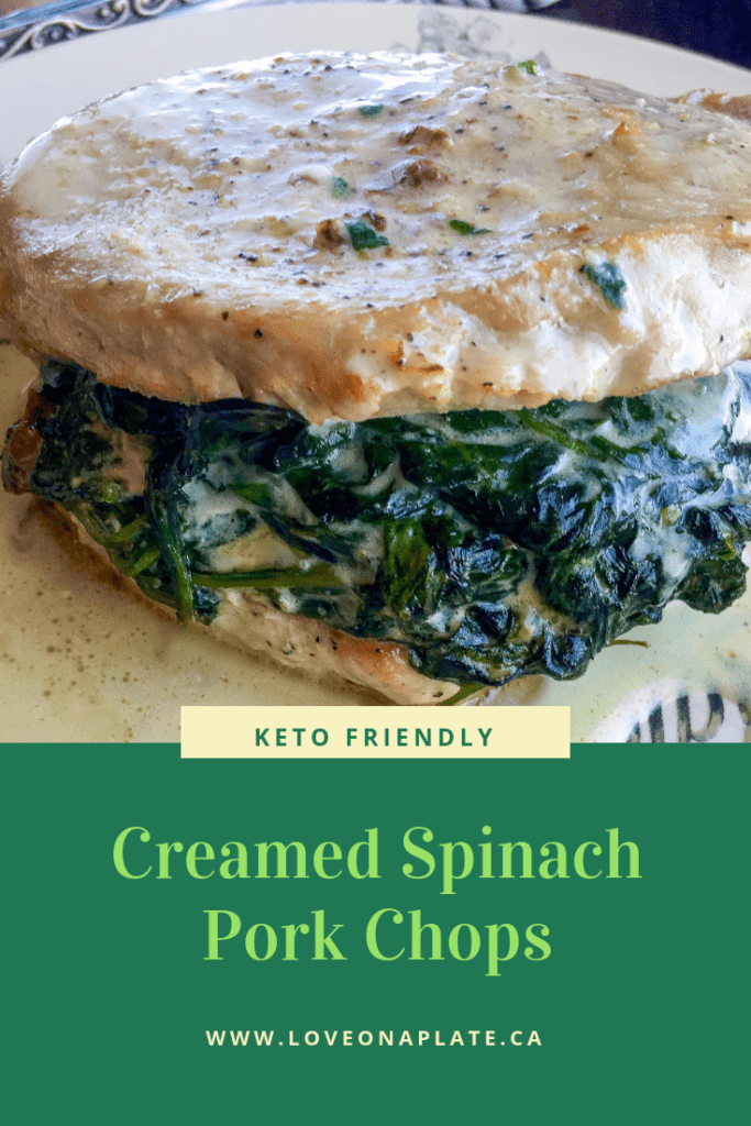 Pork Chops stuffed with creamed spinach on a white plate