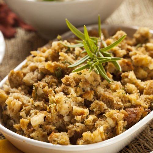 Classic bread stuffing with celery, onion and carrots is a casserole dish