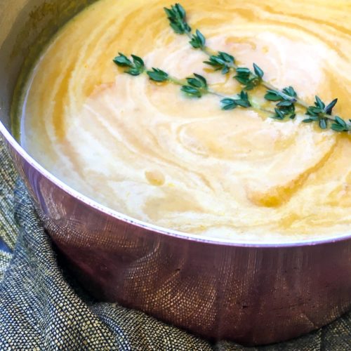 Pureed Carrot Soup in a copper bowl