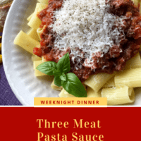 Three Meat Pasta Sauce served in a white bowl