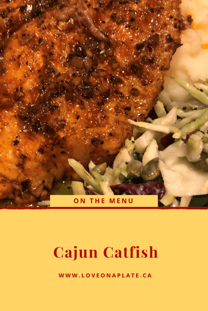 Pan Fried Catfish with cajun seasoning with mashed potatoes and broccoli slaw