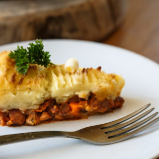 Baked Shepherds pie with minced meat on a plate