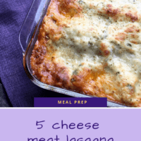Cheese topped lasagna in a 9z13 dish set on purple linen.