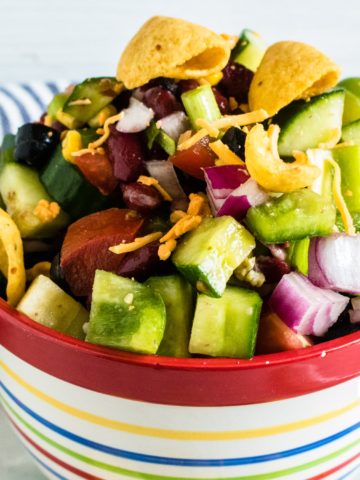 Picnic Salad; corn, kidney beans, cucumber, red onion, zucchini tossed in Catalina dressing