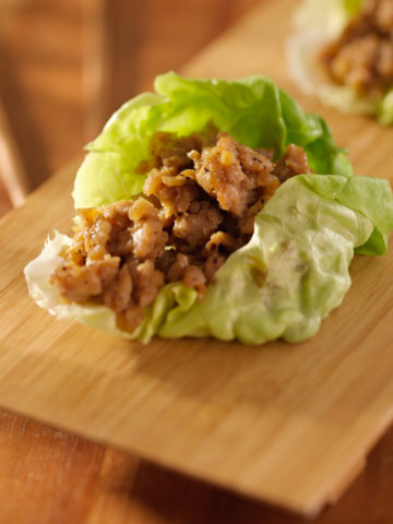 Ground Chicken stir fry with hoisin sauce in a lettuce wrap