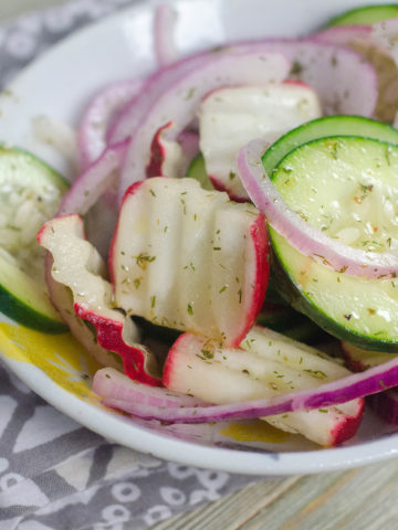 Cucumbers. Radish, Red onion, thinly sliced and tossed in vinaigrette
