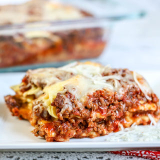 Layers of cheese ravioli, ground beef, marinara sauce and cheese baked in a casserole dish