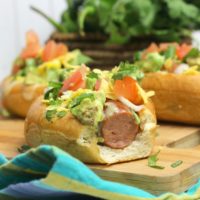 Grilled beef hot dogs topped with an exotic combo of toppings