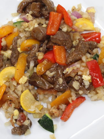 Keto friendly beef and pepper stir fry with cauliflower fried rice