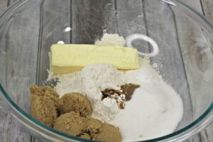 Butter, Sugar, Flour, Vanilla in a glass bowl ready for mixing
