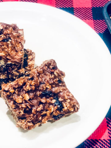 Peanut Butter Chocolate Oatmeal Bars on a Red Buffalo Check background