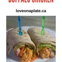 Instant Pot Buffalo Chicken filling in a flour tortilla wrap with lettuce, tomato and red onion