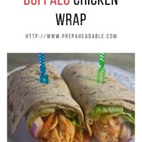 Instant Pot Buffalo Chicken filling in a flour tortilla wrap with lettuce, tomato and red onion
